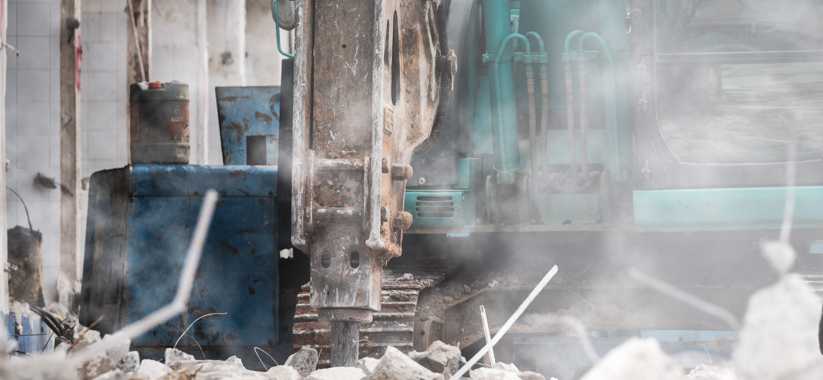 Engineer or Safety officer holding hard hat with the heavy equip